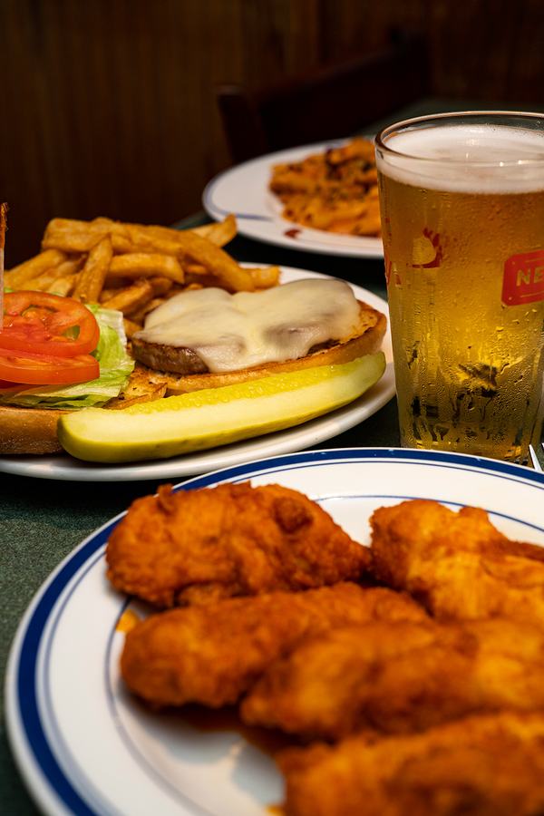 A full table — burger, fries and tenders